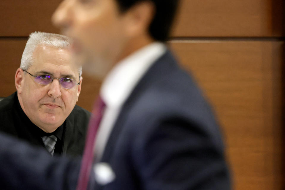 Judge Martin Fein presides at defense attorney Mark Eiglarsh as he gives his closing argument in the trial of former Marjory Stoneman Douglas High School School Resource Officer Scot Peterson, Monday, June 26, 2023, at the Broward County Courthouse in Fort Lauderdale, Fla. Peterson is accused of failing to confront the shooter who murdered 14 students and three staff members at a Parkland high school five years ago. (Amy Beth Bennett/South Florida Sun-Sentinel via AP, Pool)