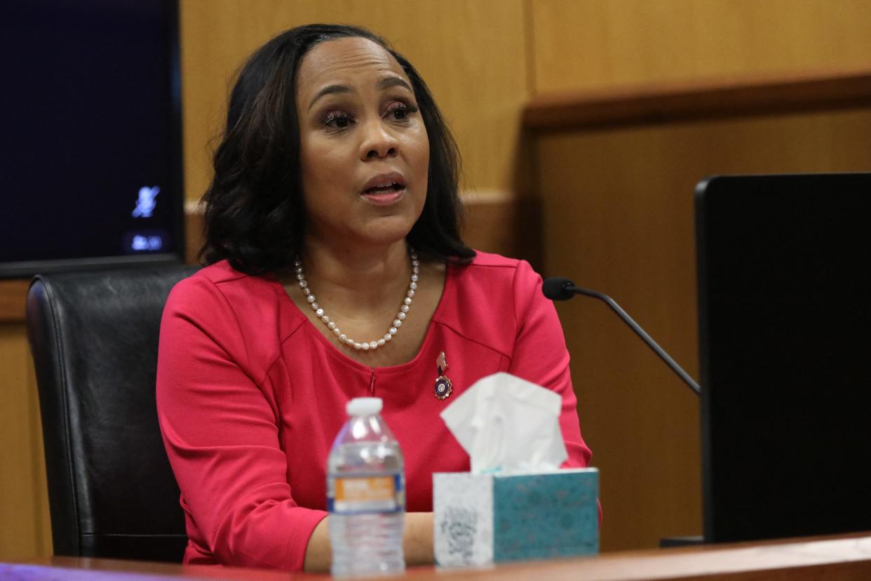 Fulton County district attorney Fani Willis testifies during a hearing into 'misconduct' allegations against her at the Fulton County Courthouse in Atlanta, Georgia, on February 15, 2024. Willis, who brought election interference charges against former US President Donald Trump, acknowledged on February 2, 2024, that she had a romantic relationship with Special Prosecutor Nathan Wade, whom she hired to work on the high-profile case. (Photo by ALYSSA POINTER / POOL / AFP) (Photo by ALYSSA POINTER/POOL/AFP via Getty Images) ORG XMIT: 776022538 ORIG FILE ID: 2006232713