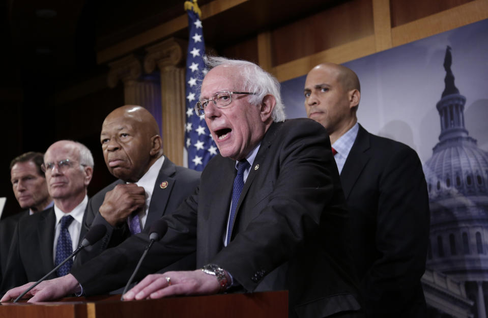 Sen. Bernie Sanders, I-Vt., center, joined from left by Sen. Richard Blumenthal, D-Conn., Rep. Peter Welch, D-Vt., Rep. Elijah Cummings, D-Md., and Sen. Cory Booker, D-N.J., speaks to reporters as he prepares to introduce new legislation that aims to reduce what Americans pay for prescription drugs, especially brand-name drugs deemed "excessively priced," during a news conference on Capitol Hill in Washington, Thursday, Jan. 10, 2019. (AP Photo/J. Scott Applewhite)