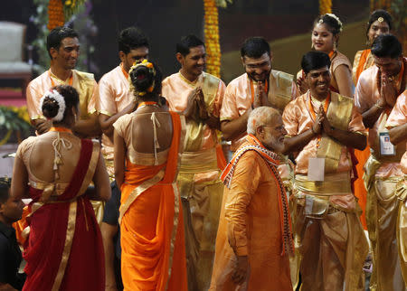 India's Prime Minister Narendra Modi leaves after attending a ritual known as "Aarti" during evening prayers on the banks of the river Ganges, after his roadshow in Varanasi, India, April 25, 2019. REUTERS/Adnan Abidi