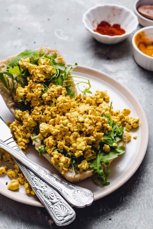 <p>My Vegan Minimalist</p><p>This healthy vegan soft tofu scramble comes together in 15 minutes using just 6 easy ingredients. Silken tofu is brightened by sweet paprika powder, garlic & black pepper. Paired with black salt and a scattering of nutritional yeast.</p><p><strong>Get the recipe: <a href="https://myveganminimalist.com/soft-tofu-scramble/" rel="nofollow noopener" target="_blank" data-ylk="slk:Vegan Soft Tofu Scramble;elm:context_link;itc:0;sec:content-canvas" class="link "><em>Vegan Soft Tofu Scramble</em></a></strong></p>