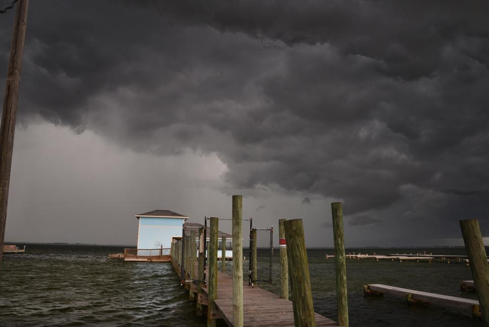 Storm clouds roll in across the lagoon near Crescent Beach Drive in south Cocoa Beach. About 5:30 p.m. Tuesday Brevard started to see some storm clouds and bad weather move in.