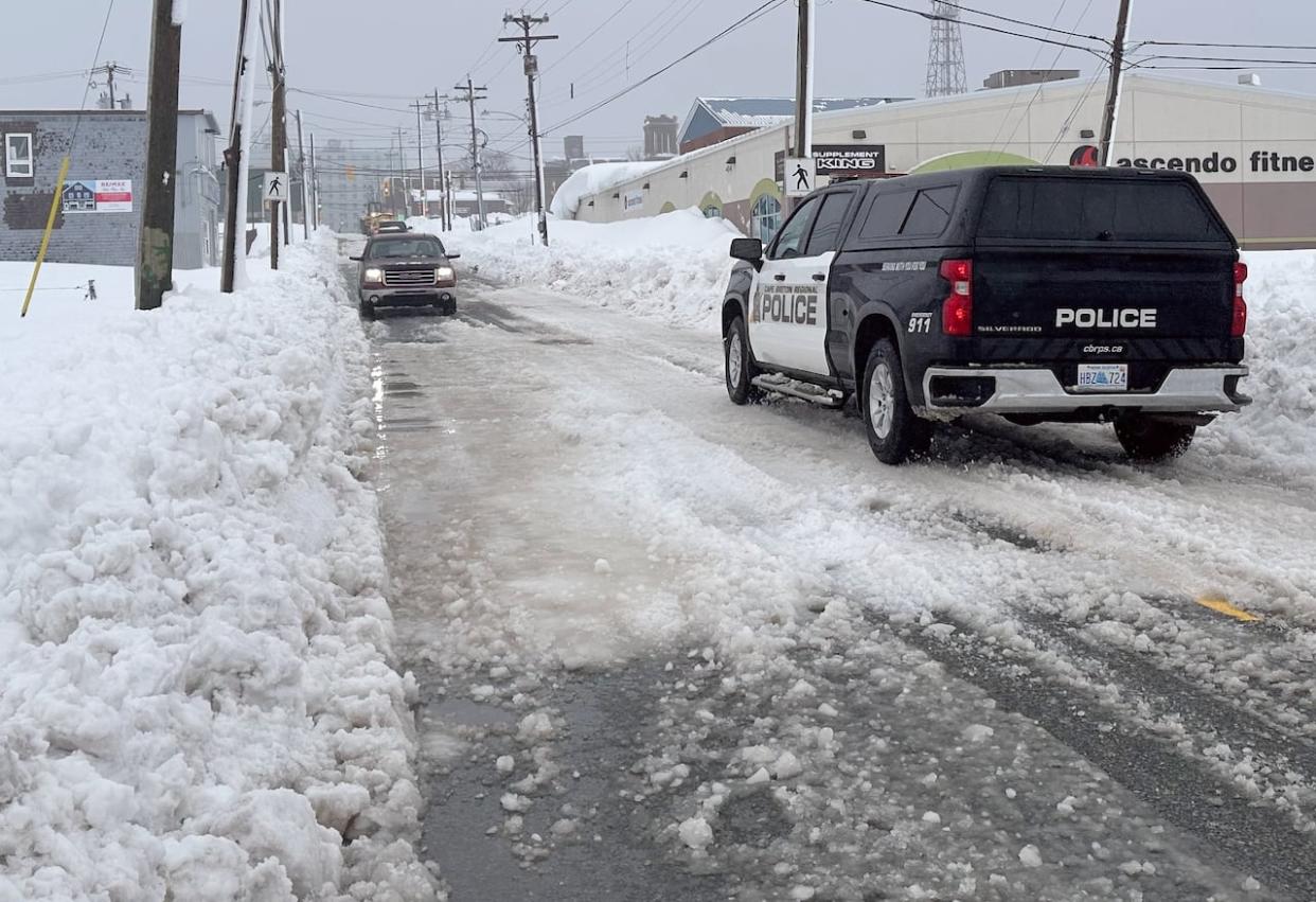 Cape Breton Regional Police say the declaration of a local state of emergency gives them the power to tow vehicles or stop drivers that are blocking snow clearing efforts. (Tom Ayers/CBC - image credit)