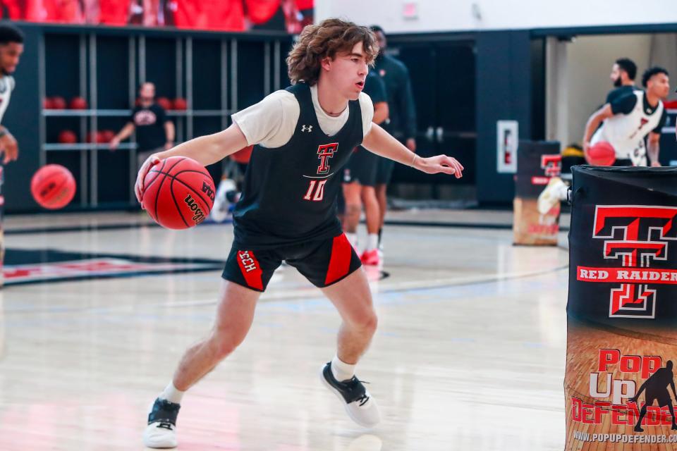 Texas Tech guard Ethan Duncan (10) handles the ball during basketball practice on Tuesday, Sept. 28, 2021, at the Dustin R. Womble Basketball Center in Lubbock, Texas.