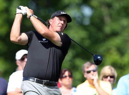 May 30, 2014; Dublin, OH, USA; Phil Mickelson tees off on the first tee during the second round of The Memorial Tournament at Muirfield Village Golf Club. Mandatory Credit: Brian Spurlock-USA TODAY Sports