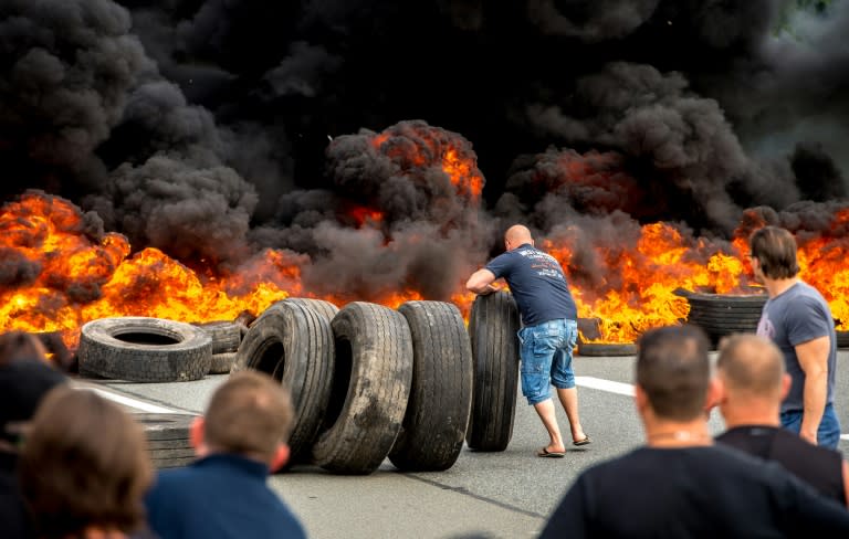 Adding to the difficulties at Calais, striking employees of the My Ferry Link company blocked access to the harbour after setting tyres on fire on July 31, 2015, following the failure of negotiations with the French government concerning job cuts