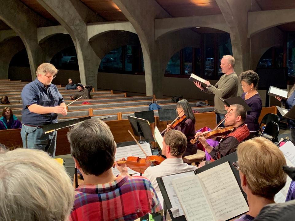 Bruce Southard conducts Ian Kirk and the Stockton Chorale in preparation for this weekend’s concert featuring the music of Ralph Vaughan Williams. [GLENN PILLSBURY/STOCKTON CHORALE]