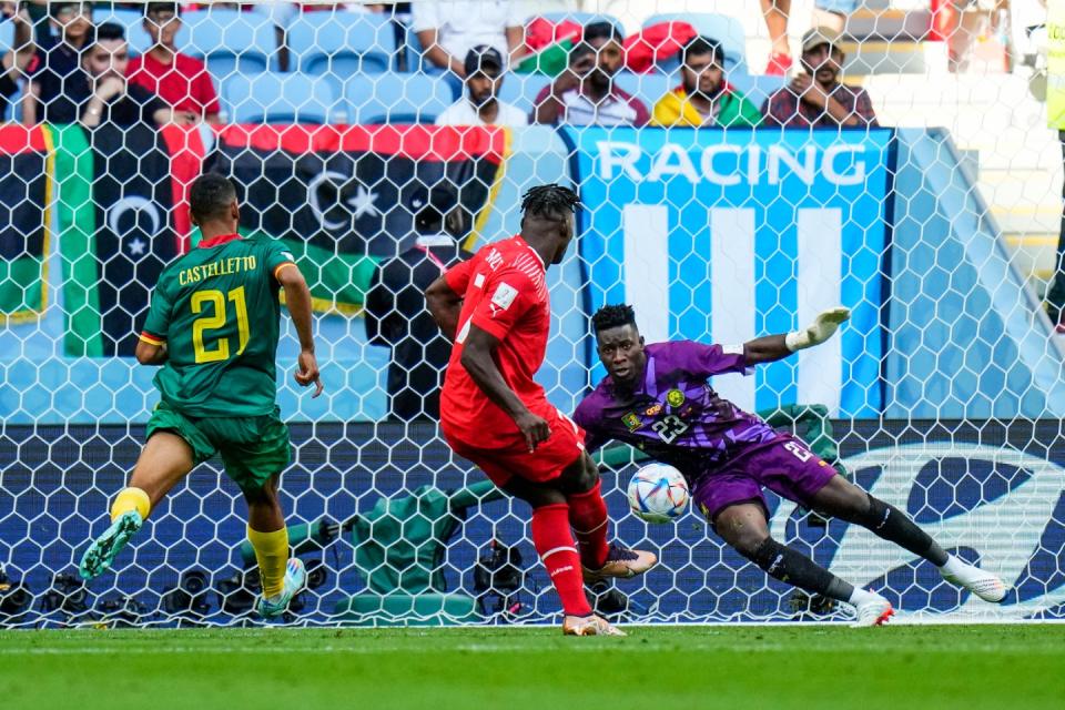 Switzerland's Breel Embolo scores the opening goal during the World Cup group G football match between Switzerland and Cameroon, at the Al Janoub Stadium in Al Wakrah, Qatar, Thursday, Nov. 24, 2022. (AP Photo/Petr Josek)