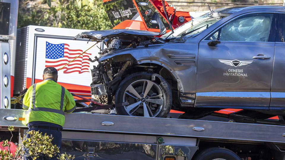 Tiger Woods' car, pictured here being removed from the crash site.