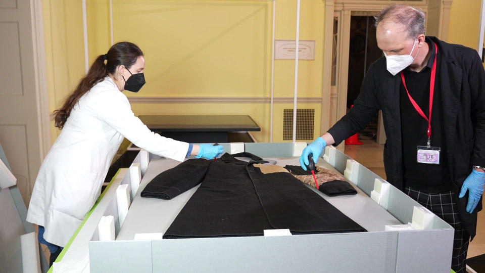 Prepared for display at New York's Metropolitan Museum of Art is the coat worn by President Lincoln on the night he was assassinated at Ford's Theatre - a treasured object that speaks to tragedy in our nation's history. / Credit: CBS News