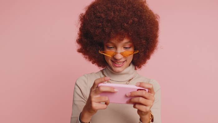 A woman looking at her phone