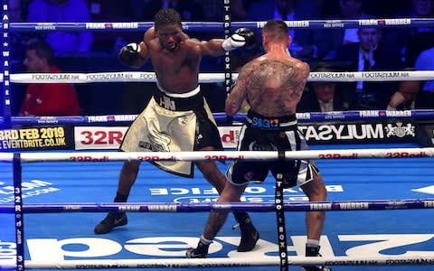 Hassam N'Dam punches Martin Murray during the WBC Silver Middleweight Championship title figh - Credit: Getty Images