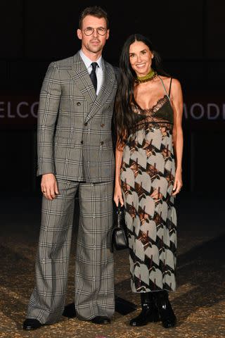 <p>Kate Green/Getty </p> Brad Goreski and Demi Moore at the Gucci Cruise 2025 show in London on May 13, 2024.