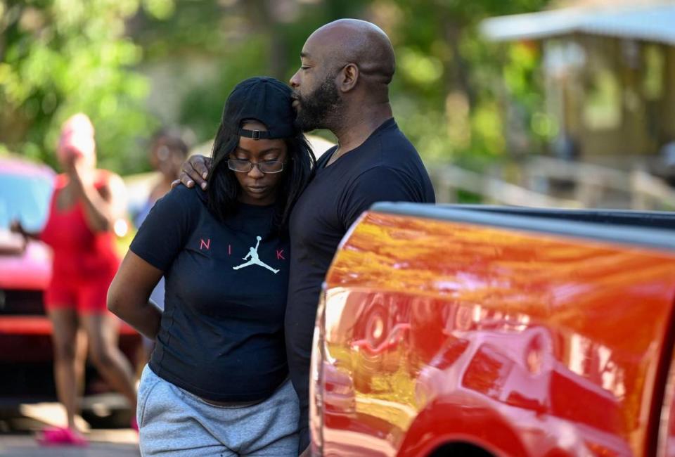 Residents gathered at 57th Street and Wabash Avenue after three people died and five were injured following a shooting on June 25 near 57th Street and Prospect Avenue in Kansas City.