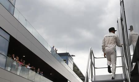 Mercedes Formula One driver Lewis Hamilton of Britain walks in his motor home after the first practice session of the Austrian F1 Grand Prix at the Red Bull Ring circuit in Spielberg, Austria, June 19, 2015. REUTERS/Leonhard Foeger -