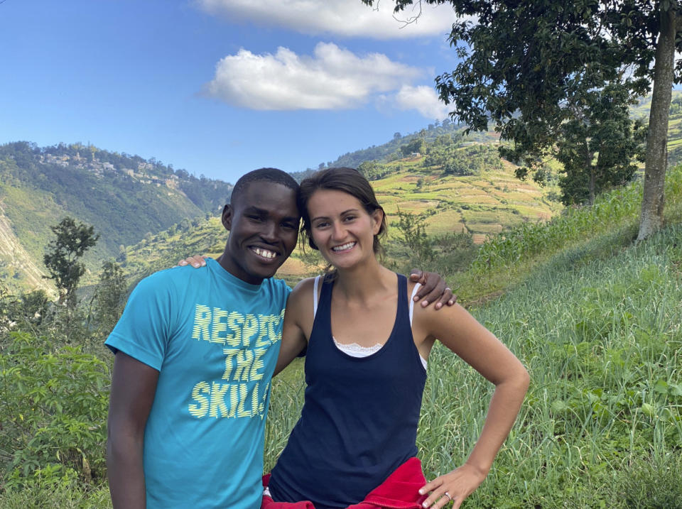 In this undated photo provided by El Roi Haiti, Alix Dorsainvil, right, poses with her husband, Sandro Dorsainvil. Alix Dorsainvil, a nurse for El Roi Haiti, and her daughter were kidnapped on Thursday, July 27, the organization said. (Courtesy of El Roi Haiti via AP)
