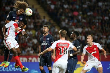 Football Soccer - Monaco v Paris St Germain - French Ligue 1 - Louis II stadium, 28/08/16. Monaco's Jermerson challenges Paris St Germain's David Luiz. REUTERS/Eric Gaillard