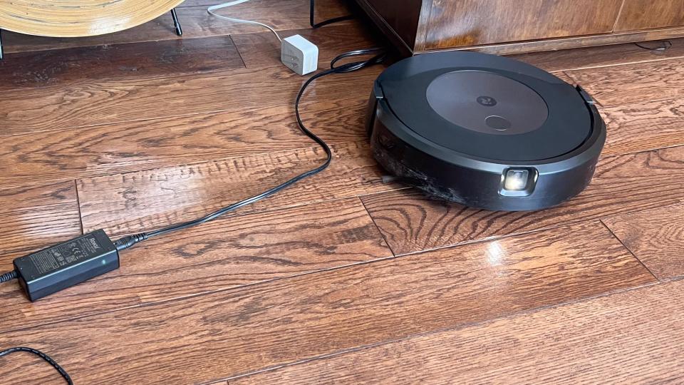 Roomba J9+ Combo robot vacuum and mop shown on floor