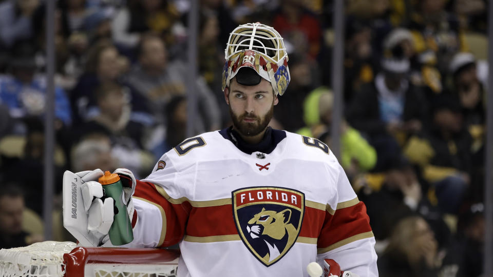 FILE - Florida Panthers goaltender Chris Driedger takes a timeout during the second period of an NHL hockey game against the Pittsburgh Penguins in Pittsburgh, in this Sunday, Jan. 5, 2020, file photo. Adam Larsson and Chris Driedger are going to the Seattle Kraken in the expansion draft. One person with knowledge of Larsson’s deal said the defenseman has agreed to terms with Seattle on a $16 million, four-year contract. Another person with knowledge of Driedger’s deal said the goaltender has agreed to a $10.5 million, three-year contract. The people spoke to The Associated Press on condition of anonymity Wednesday morning because the team was not announcing any moves until the expansion draft Wednesday night, July 21, 2021. (AP Photo/Gene J. Puskar, File)