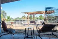 <p>The patio area with barbecue is a great place to kick back and relax. And if you want to take your relaxation to the next level, there’s an in-house masseuse. (Airbnb) </p>