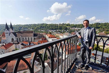 Andreas Steppberger, mayor of Eichstaett, poses on the city's townhall tower August 29, 2013. REUTERS/Michael Dalder