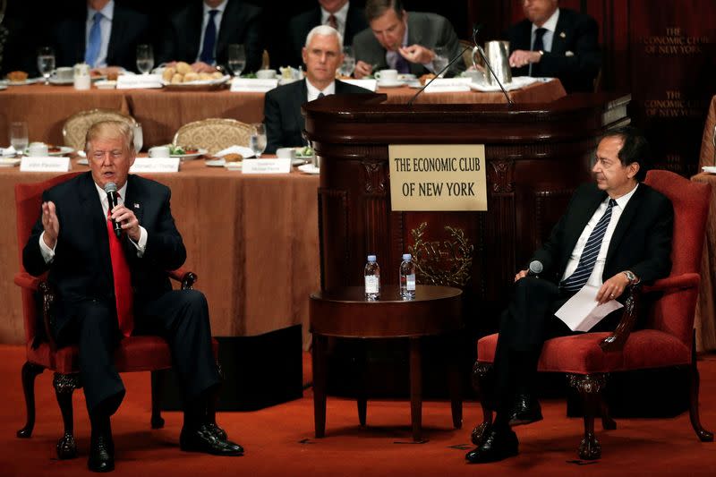 Republican presidential nominee Donald Trump is interviewed by investor John Paulson at the Economic Club of New York luncheon in Manhattan