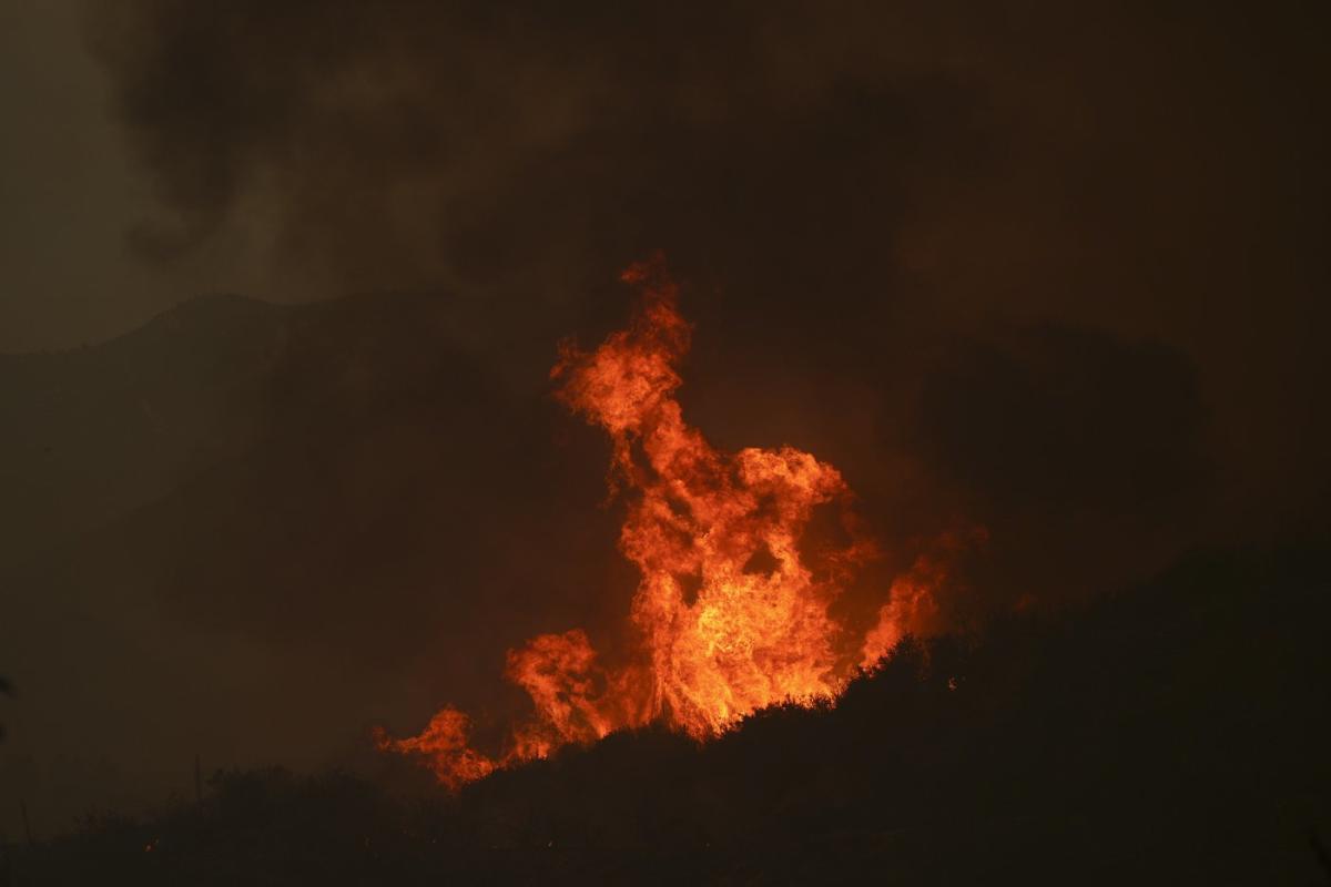 Evacuations ordered as wildfire burns in foothills of national forest east of LA