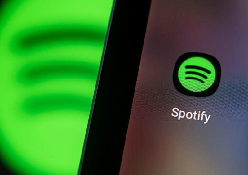 Spotify says it will bypass Apple's notorious App Store fees and start selling subscriptions and audiobooks in the EU straight from the iPhone app. Fabian Sommer/dpa