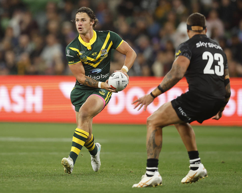 Nicho Hynes passes the ball.