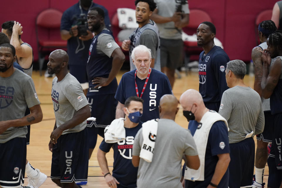 Head coach Gregg Popovich, center, coaches during practice for USA Basketball, Tuesday, July 6, 2021, in Las Vegas. (AP Photo/John Locher)