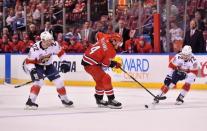 Feb 21, 2019; Sunrise, FL, USA; Florida Panthers center Frank Vatrano (72) knocks the puck away from Carolina Hurricanes right wing Justin Williams (14) during the the first period at BB&T Center. Mandatory Credit: Jasen Vinlove-USA TODAY Sports