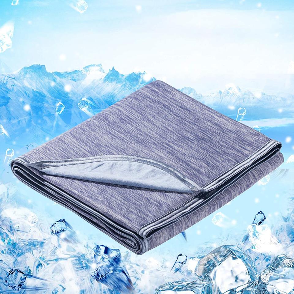 Shoppers call this 46 cooling blanket a 'lifechanger' for hot sleepers