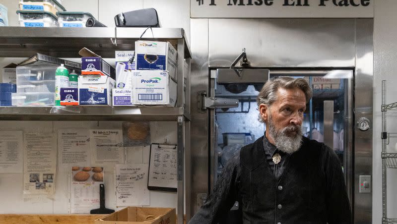 Jim Leany is seen in the kitchen of his restaurant, TRUreligion Pancake & Steakhouse, in Orem on Jan. 25, 2024. Above his head the French kitchen phrase “Mise En Place,” meaning “Everything has its place,” exhibits organization and discipline in a kitchen.