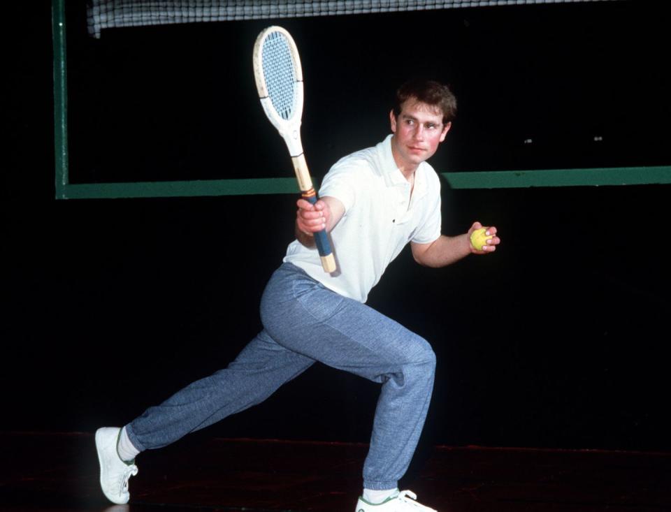 <p>Carrying on the family tradition, Prince Edward takes a swing at a tennis court in London. <br></p>