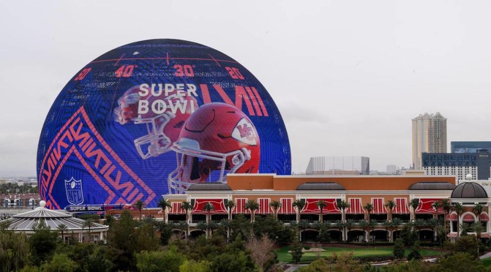 Animated Kansas City Chiefs helmets adorn Sphere on Monday, Feb. 5, 2024, in Las Vegas.
