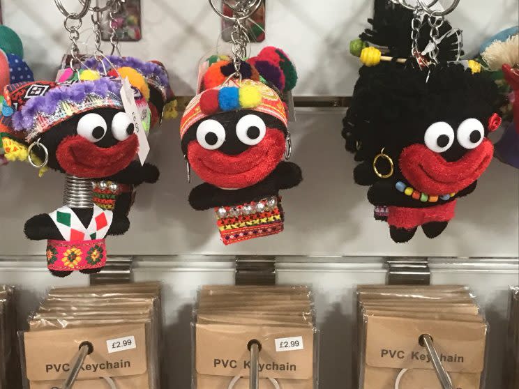 A shop has sparked a social media storm by selling keyrings that look like Golliwogs