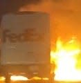 A white FedEx cargo van caught fire on southbound Interstate 15 in the Cajon Pass on Dec. 26, 2023.