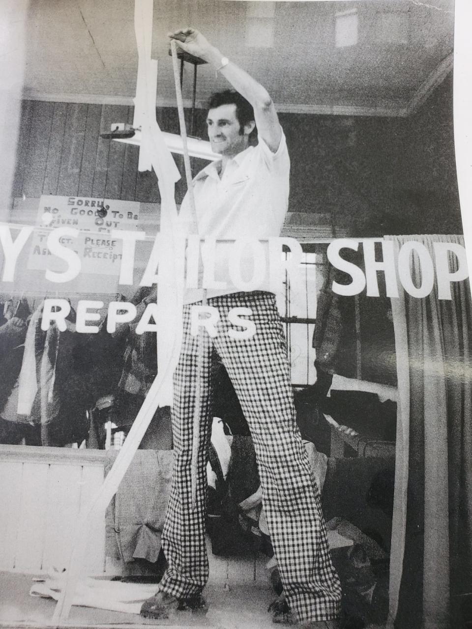 Tony Silver Sr. repairs the window of his shop on Duckworth Street in 1973. After starting his business in his parents' home, Silver rented a place on New Gower Street, at the bottom of Springdale Street on the site of what is now the Hilton Garden Hotel. Then it was on to 337 Duckworth in the Maunder Building until 1977, when he bought the building at 478 Water St. Silver moved to the current location on Freshwater Road in December 1979 and began business the following month.