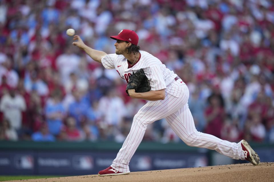 Philadelphia Phillies starting pitcher Aaron Nola thorws during the first inning of Game 3 of a baseball NL Division Series against the Atlanta Braves Wednesday, Oct. 11, 2023, in Philadelphia. (AP Photo/Matt Slocum)