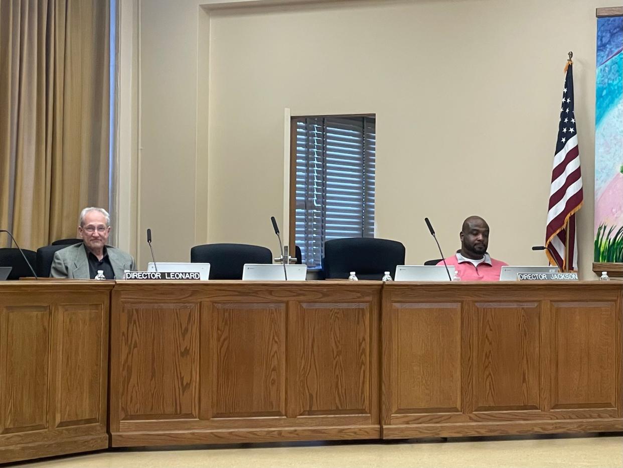 The seat where Milwaukee School Board member Aisha Carr used to sit, between board members Henry Leonard and Darryl Jackson, was empty May 7 after Carr resigned.