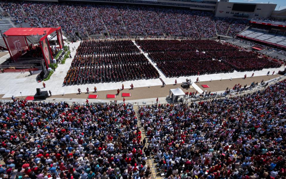 Graduates fill the field during commencement Saturday, May 11, 2024 at Camp Randall Stadium at the University of Wisconsin - Madison in Madison, Wisconsin.