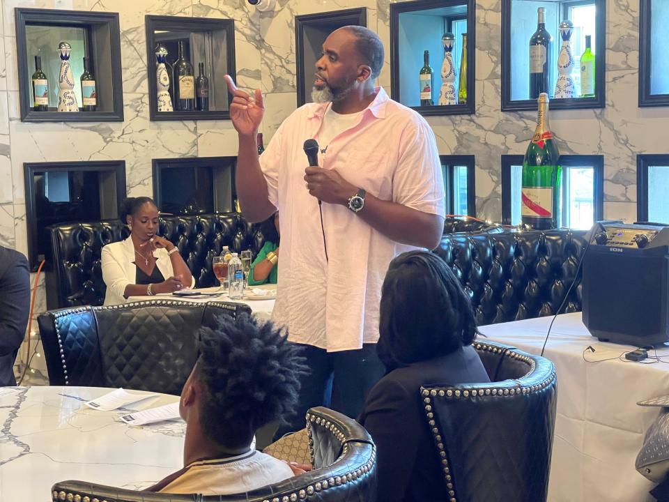 Kwame Kilpatrick urges his audience to support Donald Trump for president during a meeting at Lelli's Inn on the Green in Farmington Hills on June 24, 2024.