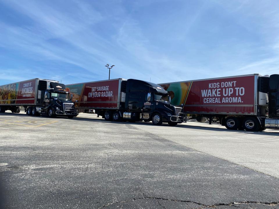 A fleet of Johnsonville trucks show the new "Keep It Juicy" ad campaign.