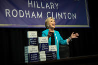 <p>SEPT. 12, 2017 – Former U.S. Secretary of State Hillary Clinton acknowledges the audience as she arrives onstage to sign copies of her new book “What Happened” during an event at Barnes and Noble bookstore in New York City. Clinton’s book focuses on her 2016 election loss to President Donald Trump. (Photo: Drew Angerer/Getty Images) </p>