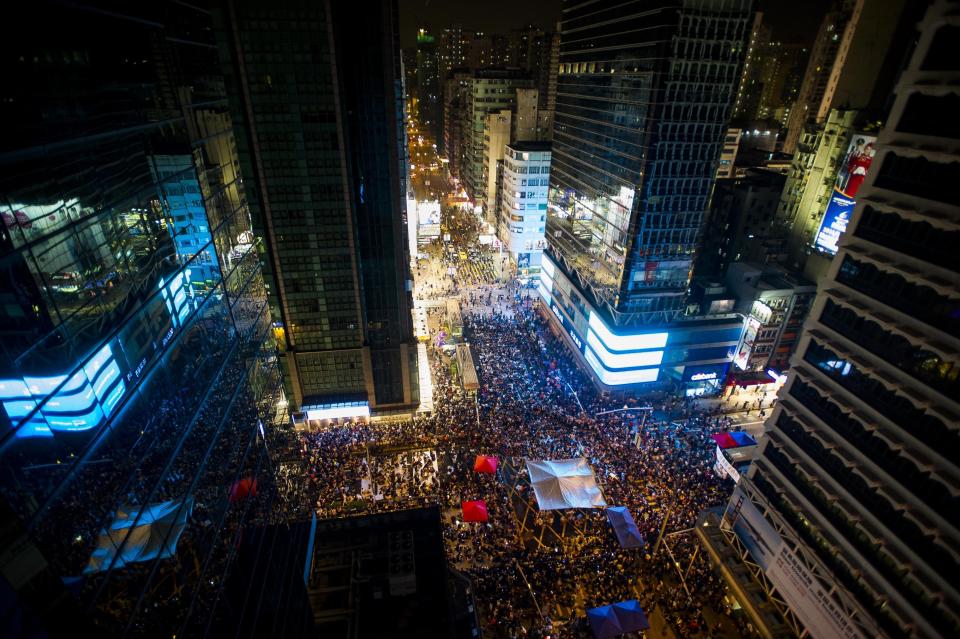 People gather during demonstrations in Hong Kong on September 30, 2014. (XAUME OLLEROS/AFP/Getty Images)