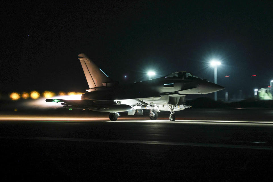 In this photo provided by Britain's Ministry of Defense, a Royal Air Force Typhoon aircraft takes off to join others in conducting further strikes against Houthi targets in Yemen, Saturday, Feb. 24, 2024. The strikes answer a recent surge in attacks by the Iran-backed militia group on ships in the Red Sea and Gulf of Aden. (Cpl. Tim Laurence/RAF/UK Ministry of Defense via AP)