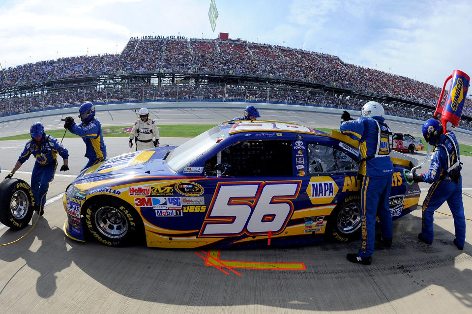 TALLADEGA, AL - OCTOBER 23: Martin Truex Jr., driver of the #56 NAPA Auto Parts Toyota, makes a pit stop during the NASCAR Sprint Cup Series Good Sam Club 500 at Talladega Superspeedway on October 23, 2011 in Talladega, Alabama. (Photo by Jason Smith/Getty Images)