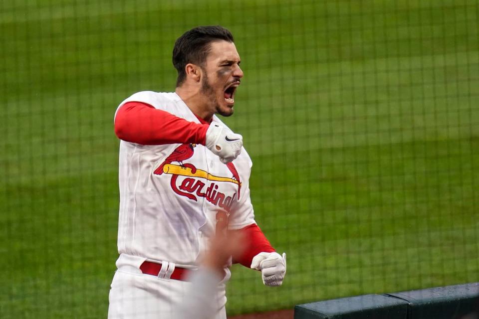 St. Louis Cardinals star Nolan Arenado celebrates after hitting a two-run home run against the Milwaukee Brewers during the 2021 season. BND Cardinals columnist Jeff Jones forecasts Arenado will win National League MVP honors this season while making other bold predictions.