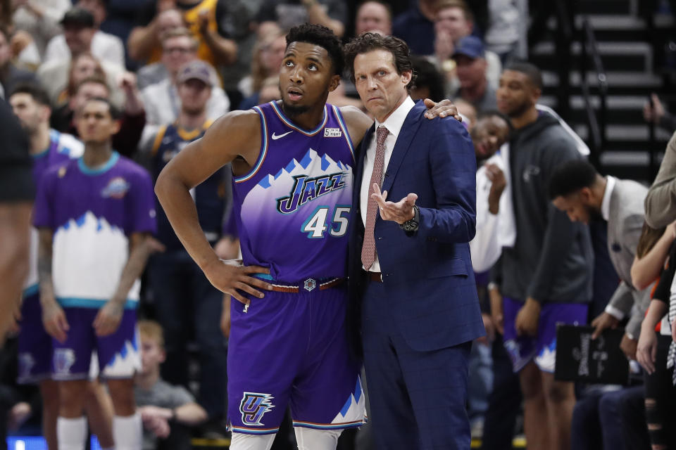 Utah Jazz guard Donovan Mitchell takes a moment with head coach Quin Snyder during the fourth quarter against the Portland Trail Blazers on Thursday, Dec. 26, 2019, in Salt Lake City.