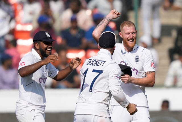 England captain Ben Stokes (right) celebrates with his team.